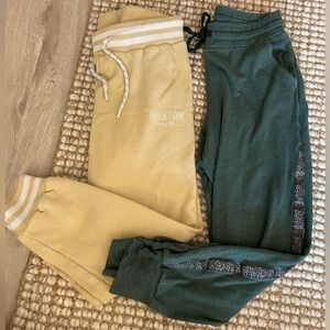 2 Pairs of jogger style sweat pants with drawstrings